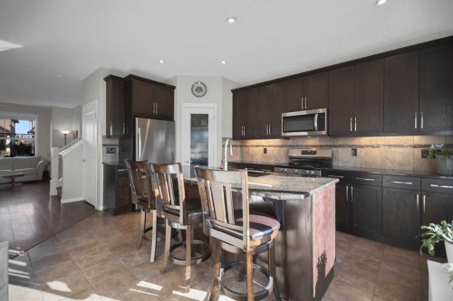 61 Cranford Place Se, Calgary, AB - Indoor Photo Showing Kitchen
