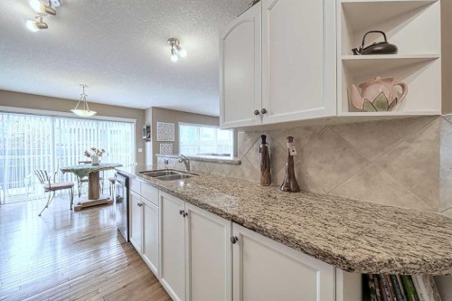 73 Everwoods Road Sw, Calgary, AB - Indoor Photo Showing Kitchen With Double Sink