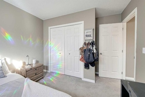 73 Everwoods Road Sw, Calgary, AB - Indoor Photo Showing Bedroom