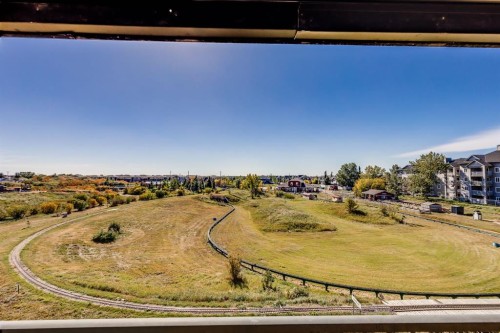 7308-304 Mackenzie Way Sw, Airdrie, AB - Outdoor With View