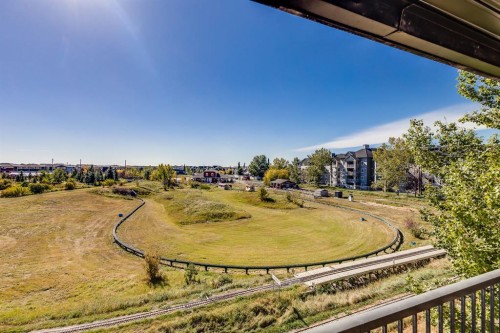 7308-304 Mackenzie Way Sw, Airdrie, AB - Outdoor With View
