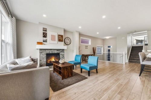 59 Sage Bluff Road Nw, Calgary, AB - Indoor Photo Showing Living Room With Fireplace