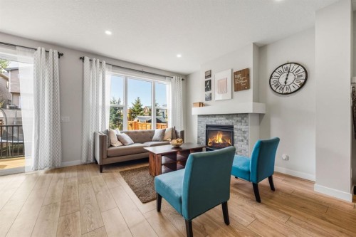 59 Sage Bluff Road Nw, Calgary, AB - Indoor Photo Showing Living Room With Fireplace