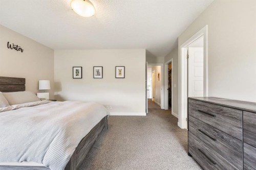 59 Sage Bluff Road Nw, Calgary, AB - Indoor Photo Showing Bedroom