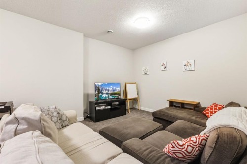 59 Sage Bluff Road Nw, Calgary, AB - Indoor Photo Showing Living Room