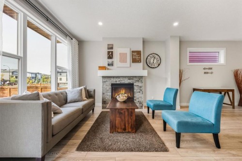 59 Sage Bluff Road Nw, Calgary, AB - Indoor Photo Showing Living Room With Fireplace
