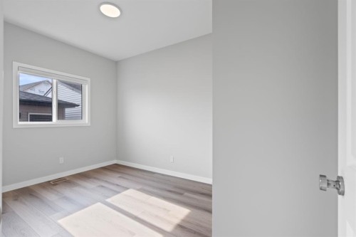 460 Lewiston Landing Ne, Calgary, AB - Indoor Photo Showing Other Room