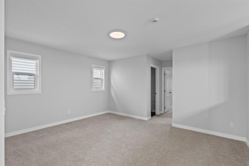 460 Lewiston Landing Ne, Calgary, AB - Indoor Photo Showing Other Room