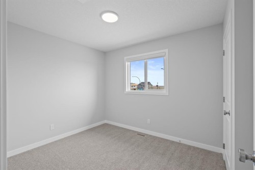 460 Lewiston Landing Ne, Calgary, AB - Indoor Photo Showing Other Room