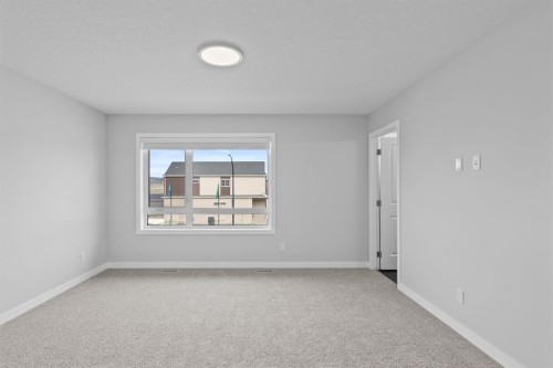 460 Lewiston Landing Ne, Calgary, AB - Indoor Photo Showing Other Room