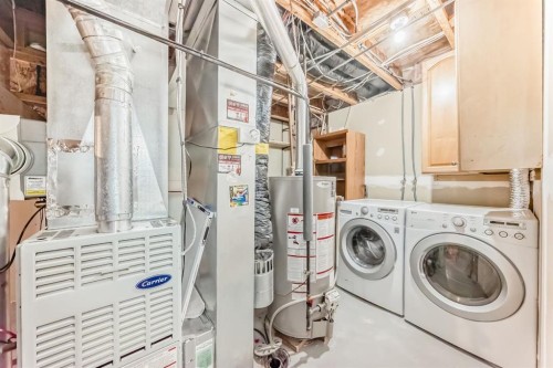 261 Bridlecreek Park Sw, Calgary, AB - Indoor Photo Showing Laundry Room