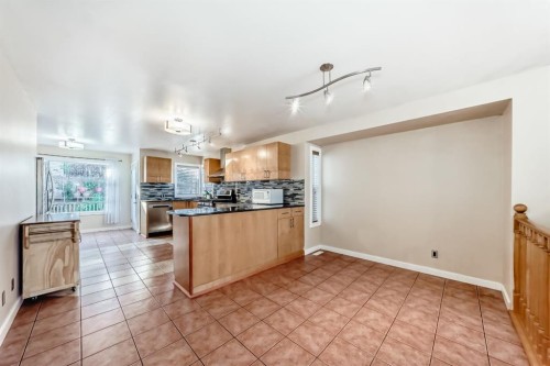 261 Bridlecreek Park Sw, Calgary, AB - Indoor Photo Showing Kitchen