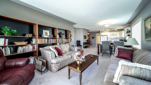 2206-7451 Springbank Boulevard Sw, Calgary, AB - Indoor Photo Showing Living Room