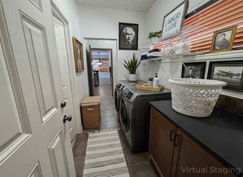 79 Tuscany Summit Bay Nw, Calgary, AB - Indoor Photo Showing Laundry Room