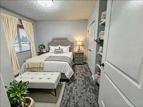 79 Tuscany Summit Bay Nw, Calgary, AB - Indoor Photo Showing Bedroom