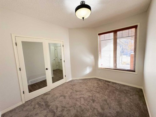 79 Tuscany Summit Bay Nw, Calgary, AB - Indoor Photo Showing Other Room