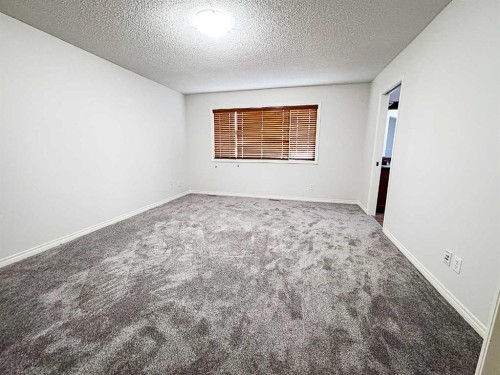 79 Tuscany Summit Bay Nw, Calgary, AB - Indoor Photo Showing Other Room