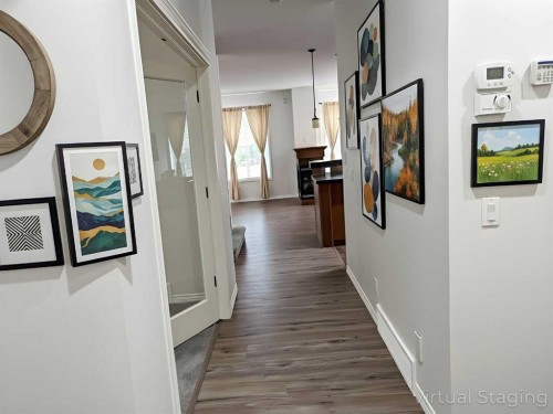 79 Tuscany Summit Bay Nw, Calgary, AB - Indoor Photo Showing Other Room