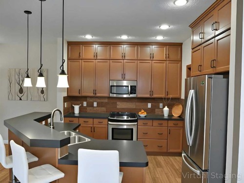 79 Tuscany Summit Bay Nw, Calgary, AB - Indoor Photo Showing Kitchen With Double Sink With Upgraded Kitchen