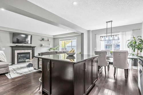 2930 Chinook Winds Drive Sw, Airdrie, AB - Indoor With Fireplace