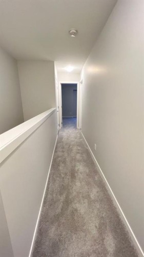608 Copperstone Manor Se, Calgary, AB - Indoor Photo Showing Other Room