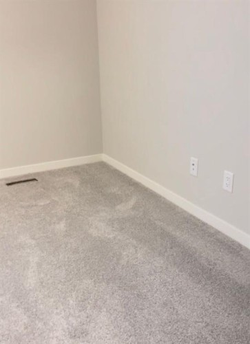 608 Copperstone Manor Se, Calgary, AB - Indoor Photo Showing Other Room