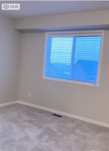 608 Copperstone Manor Se, Calgary, AB - Indoor Photo Showing Other Room