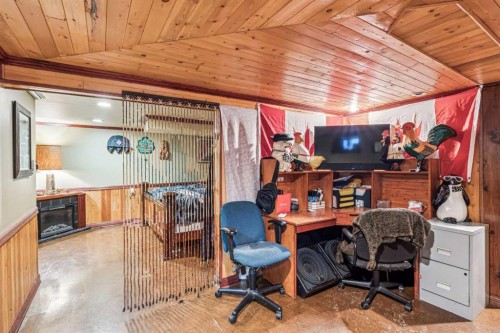 663 10 Avenue South, Carstairs, AB - Indoor With Fireplace