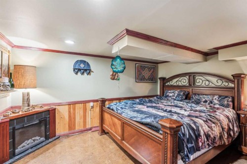 663 10 Avenue South, Carstairs, AB - Indoor Photo Showing Bedroom