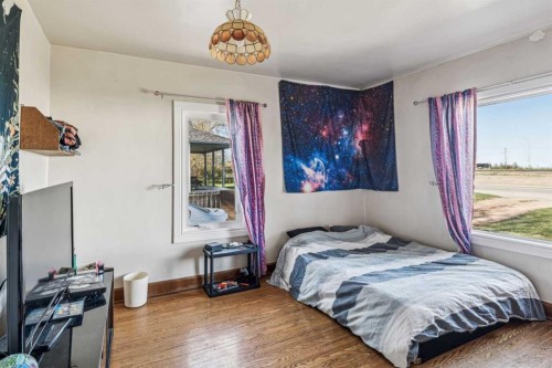 663 10 Avenue South, Carstairs, AB - Indoor Photo Showing Bedroom