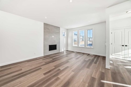 729 Grayling Link, Rural Rocky View County, AB - Indoor With Fireplace