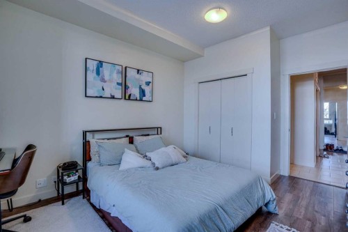 101-8710 Horton Road Sw, Calgary, AB - Indoor Photo Showing Bedroom
