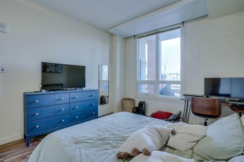 101-8710 Horton Road Sw, Calgary, AB - Indoor Photo Showing Bedroom