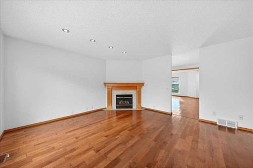 50 Citadel Ridge Green Nw, Calgary, AB - Indoor Photo Showing Other Room With Fireplace