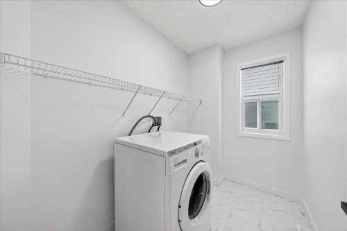 50 Citadel Ridge Green Nw, Calgary, AB - Indoor Photo Showing Laundry Room