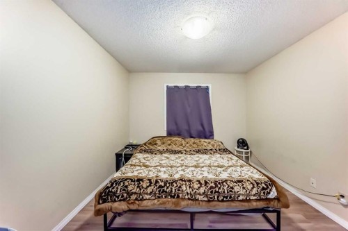 10 Saddlebrook Gardens Ne, Calgary, AB - Indoor Photo Showing Bedroom