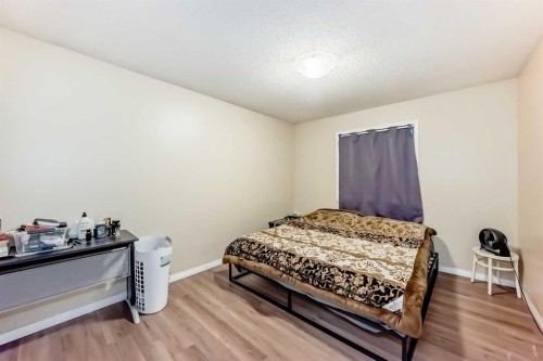 10 Saddlebrook Gardens Ne, Calgary, AB - Indoor Photo Showing Bedroom