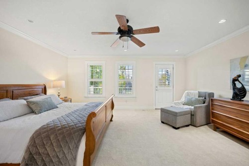 24 Ypres Mews Sw, Calgary, AB - Indoor Photo Showing Bedroom