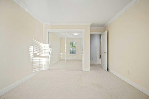 24 Ypres Mews Sw, Calgary, AB - Indoor Photo Showing Other Room