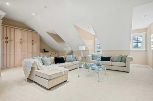 24 Ypres Mews Sw, Calgary, AB - Indoor Photo Showing Living Room