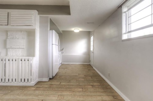 133 Hidden Spring Circle Nw, Calgary, AB - Indoor Photo Showing Other Room