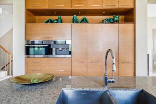 374 Discovery Ridge Way Sw, Calgary, AB - Indoor Photo Showing Kitchen With Double Sink With Upgraded Kitchen