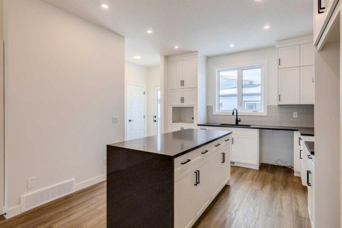5005 Harmony Circle, Rural Rocky View County, AB - Indoor Photo Showing Kitchen