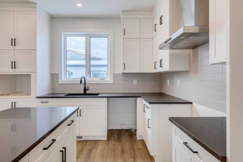5005 Harmony Circle, Rural Rocky View County, AB - Indoor Photo Showing Kitchen