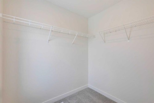 5005 Harmony Circle, Rural Rocky View County, AB - Indoor With Storage