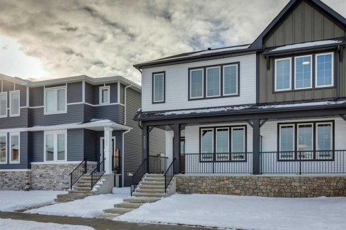 5005 Harmony Circle, Rural Rocky View County, AB - Outdoor With Facade