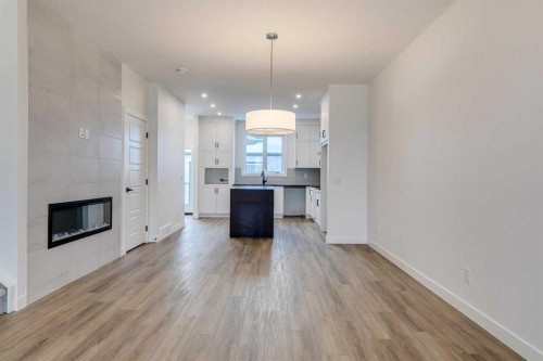 5005 Harmony Circle, Rural Rocky View County, AB - Indoor With Fireplace