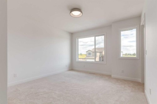 1154 Cobblestone Boulevard, Airdrie, AB - Indoor Photo Showing Other Room