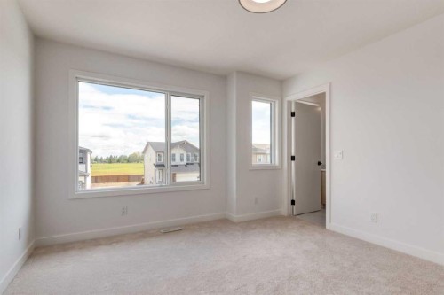 1154 Cobblestone Boulevard, Airdrie, AB - Indoor Photo Showing Other Room