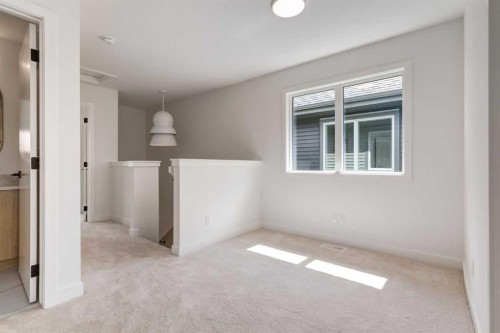 1162 Cobblestone Boulevard, Airdrie, AB - Indoor Photo Showing Other Room
